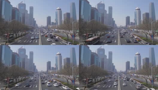 晴朗的一天，中国北京的中央商务区。摩天大楼和路上的汽车交通高清在线视频素材下载
