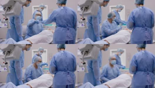 拉丁裔医生和他的手术团队一起做手术高清在线视频素材下载
