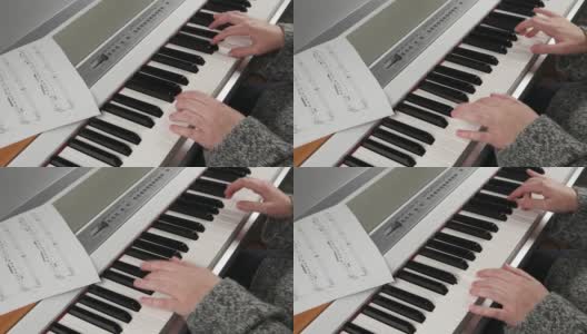 弹机电钢琴，弹钢琴的女孩。高清在线视频素材下载