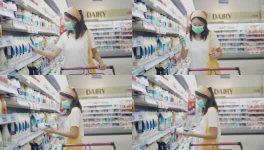 一位女士在超市里戴着防护口罩。高清在线视频素材下载