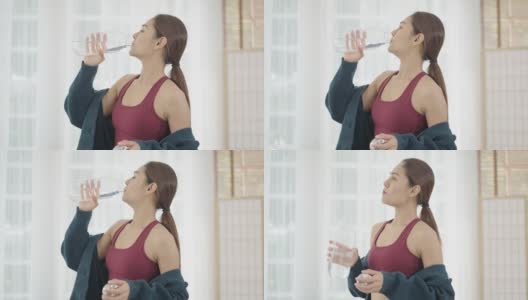 女人在家做瑜伽时喝水高清在线视频素材下载