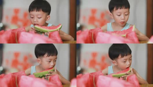 可爱的亚洲宝宝吃西瓜高清在线视频素材下载