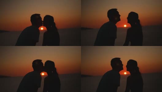 一对浪漫的情侣在夕阳下接吻高清在线视频素材下载