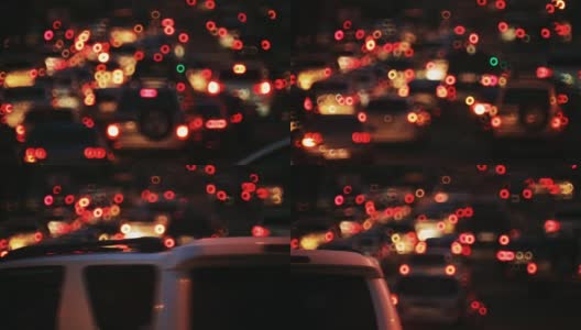 交通灯夜景散。开车在城市。有汽车的夜城高清在线视频素材下载