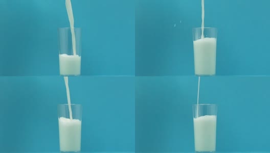 新鲜牛奶倒在玻璃上，蓝色背景，钙和磷的来源高清在线视频素材下载
