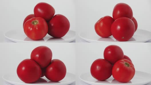 在白色背景下旋转的新鲜番茄高清在线视频素材下载