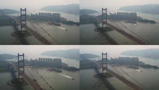 鸟瞰图跨岛桥和远洋集装箱船高清在线视频素材下载