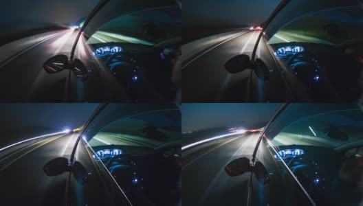 夜间行驶在高速公路上，被模糊的街道和车灯照亮高清在线视频素材下载