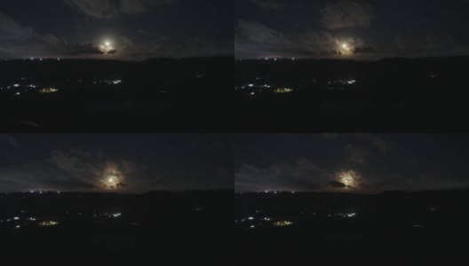 山岗上的满月夜晚时光流逝。月亮随云移动高清在线视频素材下载