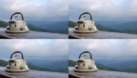 早晨的茶壶场景，雾和山的背景高清在线视频素材下载