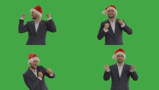 年轻商人戴着帽子跳舞的圣诞老人高清在线视频素材下载