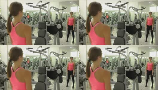 健康妇女通过伸展肌肉准备锻炼高清在线视频素材下载