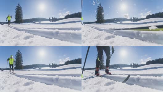 年轻男子运动员在滑雪道上越野滑雪高清在线视频素材下载