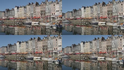 建筑立面和水面倒影的著名的北诺曼底艺术场所和港口由天慢摇镜头高清在线视频素材下载
