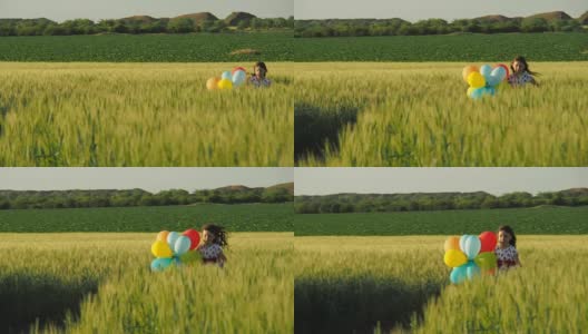快乐的孩子与气球在自然界高清在线视频素材下载