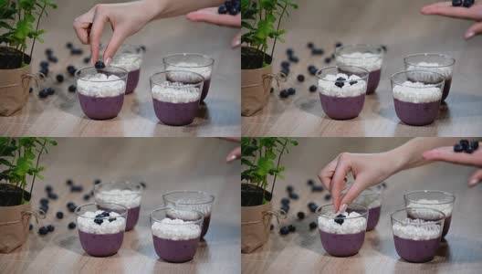 用玻璃杯装饰蓝莓意式奶冻高清在线视频素材下载