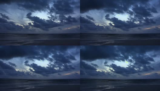 黄昏时分，海滩上的云在地平线上快速移动高清在线视频素材下载