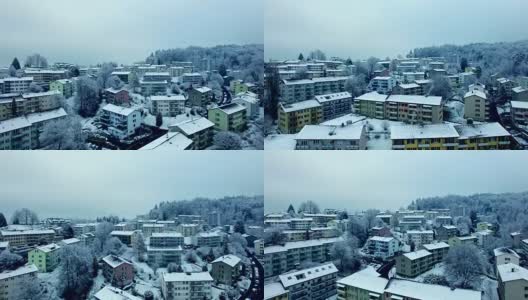 冬日里白雪覆盖的村庄的Arial照片高清在线视频素材下载