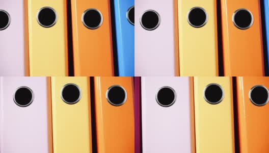 Closeup many colorful binders as office background 4K高清在线视频素材下载