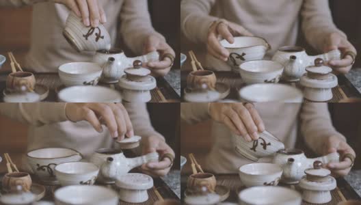 传统泡茶——将红茶倒入杯中高清在线视频素材下载