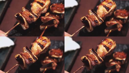 日本烧鸡在居酒屋餐厅鸡串烧烤开胃菜高清在线视频素材下载