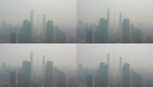 晴天雾霾飞行飞越广州市市中心著名广场航拍全景4k中国高清在线视频素材下载