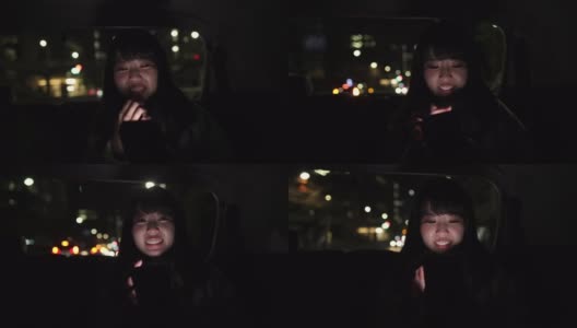 晚上坐在出租车里的年轻日本女人-第二部分高清在线视频素材下载