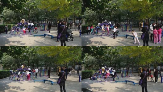 北京,China-Oct。2014年17日，中国北京，孩子们在地坛公园自由玩耍高清在线视频素材下载