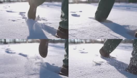一个人的脚在雪山上行走的特写。慢动作拍摄高清在线视频素材下载