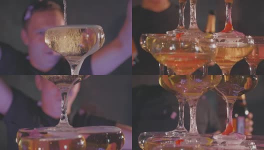 侍者倒香槟在杯子在金字塔的慢动作，特写高清在线视频素材下载