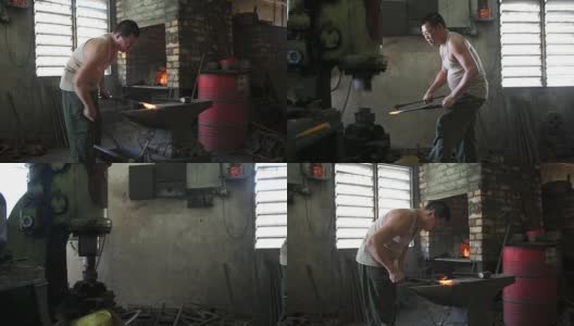 亚洲铁匠在他的车间里在铁砧上锻造热铁高清在线视频素材下载