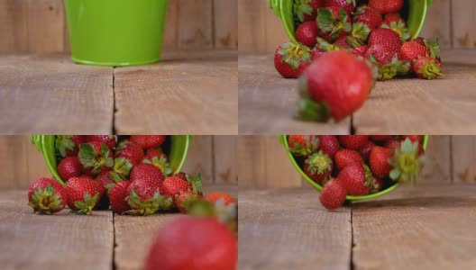 草莓从桶上落到木头上的慢动作高清在线视频素材下载