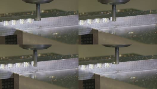 在数控机床上铣削金属零件的形状高清在线视频素材下载