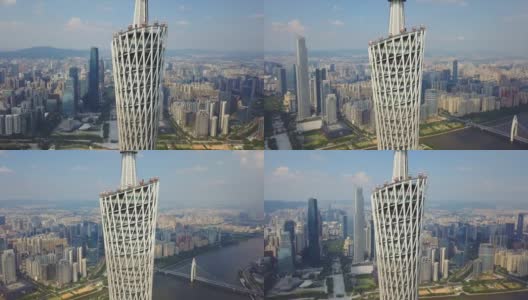 阳光明媚的广州市中心著名的广州塔观景台顶部高空近距离拍摄4k中国高清在线视频素材下载