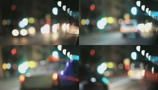 夜间城市交通的焦点。汽车的前灯和尾灯失去焦点。高清在线视频素材下载