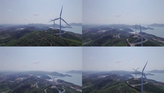 俯瞰岛顶的风力涡轮机高清在线视频素材下载