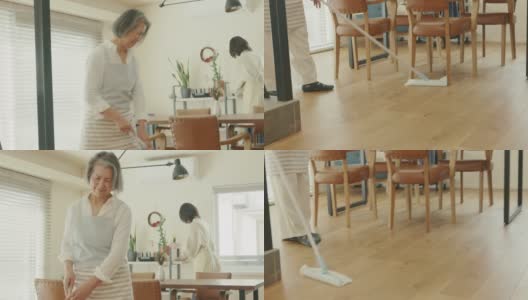 在一个现代化的房子里，一家人一起打扫卫生高清在线视频素材下载