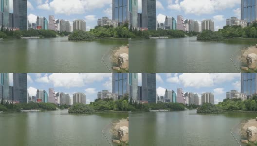 天际线和现代化的办公大楼与深圳的大池塘，实时。高清在线视频素材下载