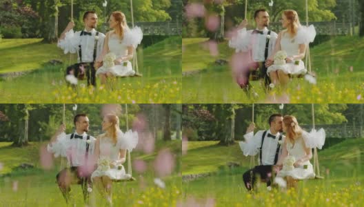 SLO MO DS新婚夫妇在大自然的秋千上接吻高清在线视频素材下载