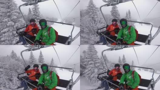 滑雪度假——情侣在滑雪缆车里自拍。寒假滑雪的概念。在雪坡上滑雪，人们在雪天有乐趣-冬季户外运动高清在线视频素材下载