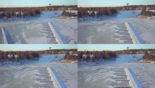 从空中近距离观察芬兰港口结冰的海水高清在线视频素材下载
