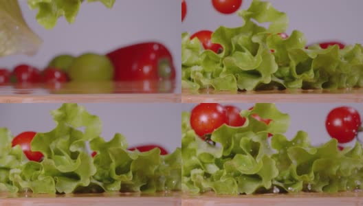 宏观景深:清洁的番茄和长叶莴苣叶落在木制的台面上高清在线视频素材下载