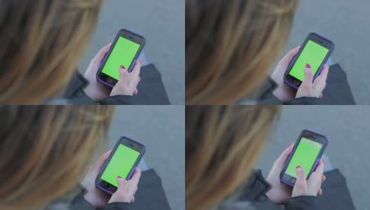 年轻的孤独女子在智能手机绿色屏幕上冲浪高清在线视频素材下载