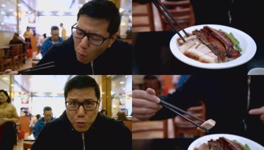 一名男子正在用筷子吃中国的五花肉高清在线视频素材下载