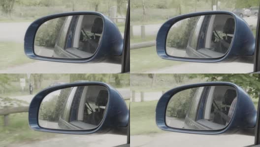 移动汽车的后视镜，反射中的婴儿高清在线视频素材下载