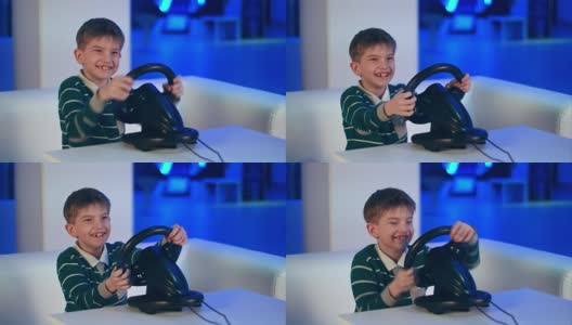 快乐兴奋的小男孩玩电子游戏与赛车轮高清在线视频素材下载