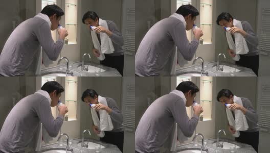 男人在家里使用鼻腔冲洗预防他的慢性疾病高清在线视频素材下载