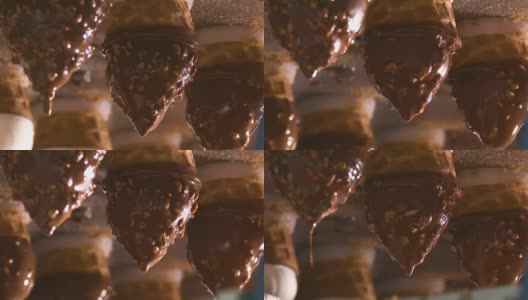 冰淇淋工厂里的巧克力酱和坚果高清在线视频素材下载