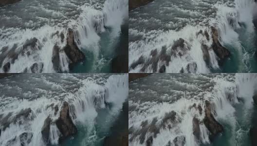 直升机上美丽的野生瀑布。冰岛湍流的鸟瞰图高清在线视频素材下载