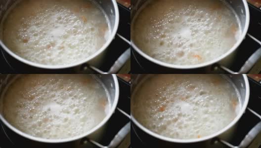 在不锈钢锅里混合煮过的米饭高清在线视频素材下载